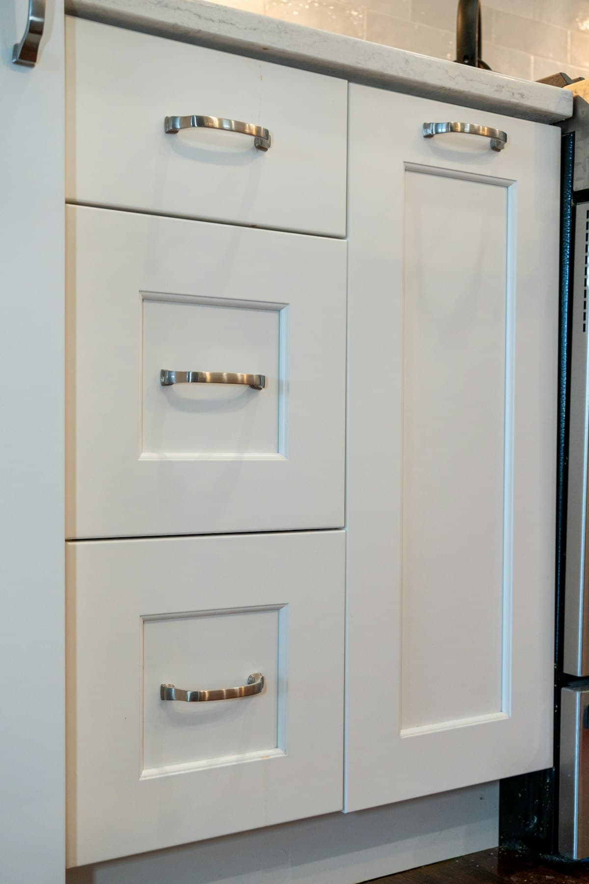 Freshly painted white shaker kitchen cabinets